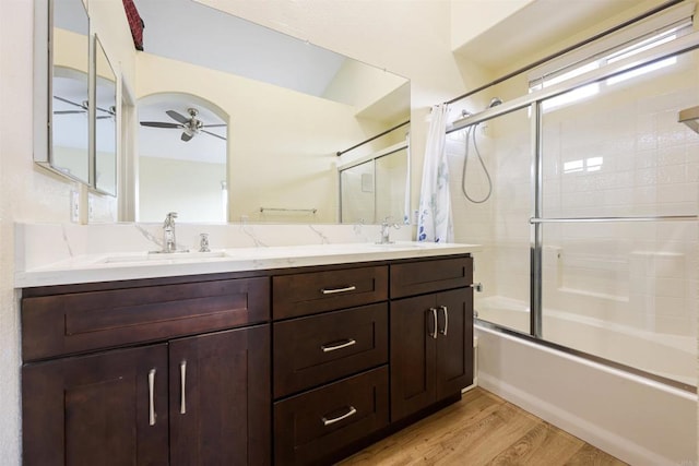 11869 Spruce Run Dr Unit B, San Diego, CA 92131 - full bath featuring enclosed tub / shower combo, double vanity, ceiling fan, and wood finished floors