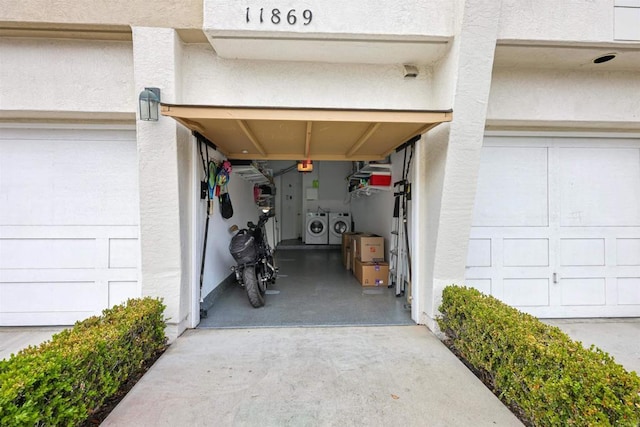 11869 Spruce Run Dr Unit B, San Diego, CA 92131 - garage with washing machine and clothes dryer