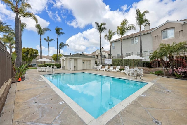 11869 Spruce Run Dr Unit B, San Diego, CA 92131 - community pool featuring a patio area and a residential view