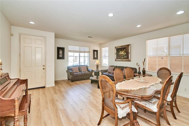 dining space featuring recessed lighting, light wood finished floors, visible vents, and baseboards