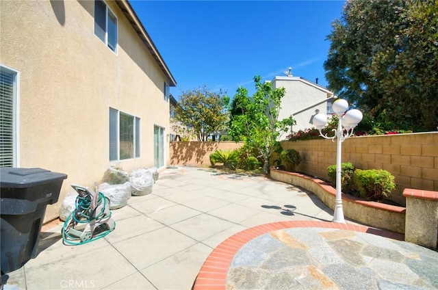 view of patio featuring a fenced backyard