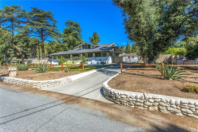 view of front of home with fence