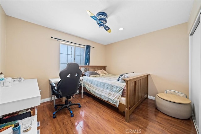 1010 W Wilson St, Pomona, CA 91768 - bedroom with baseboards and wood finished floors