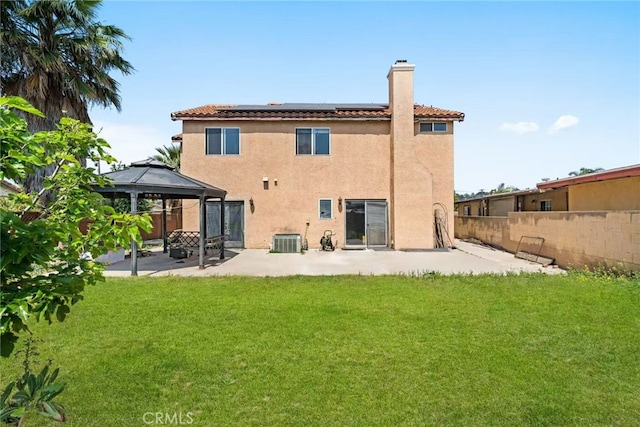 1010 W Wilson St, Pomona, CA 91768 - rear view of property with a gazebo, solar panels, a lawn, and a patio