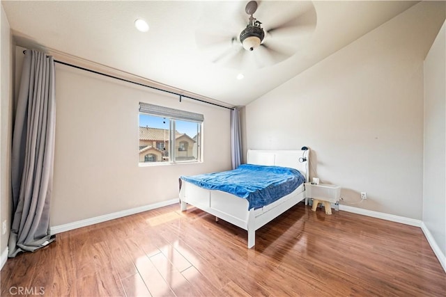 1010 W Wilson St, Pomona, CA 91768 - bedroom featuring vaulted ceiling, baseboards, wood finished floors, and recessed lighting