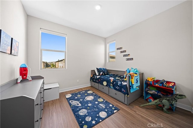248 Keeper, Irvine, CA 92618 - bedroom with baseboards and wood finished floors