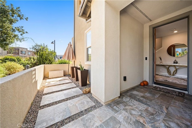 248 Keeper, Irvine, CA 92618 - view of exterior entry featuring stucco siding and fence