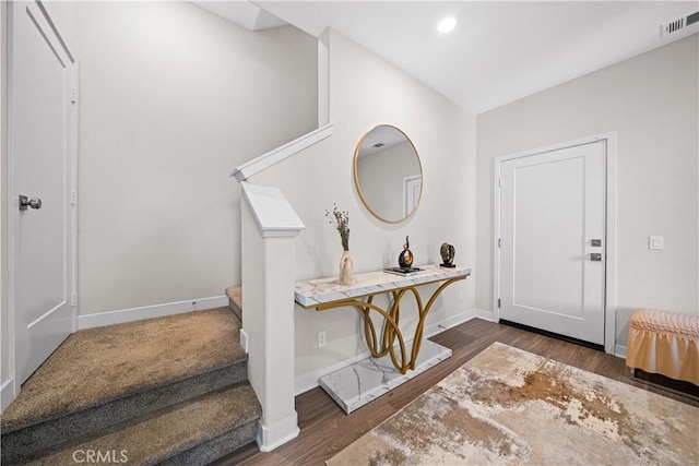 248 Keeper, Irvine, CA 92618 - entryway featuring wood finished floors, baseboards, visible vents, and stairway