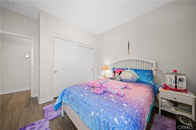 248 Keeper, Irvine, CA 92618 - bedroom featuring a closet, baseboards, and wood finished floors