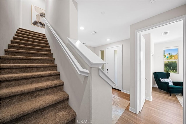 248 Keeper, Irvine, CA 92618 - staircase featuring visible vents, baseboards, recessed lighting, and wood finished floors