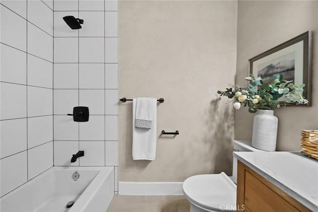 bathroom featuring bathtub / shower combination and toilet