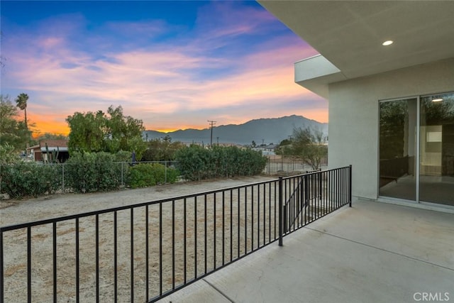 balcony featuring a mountain view