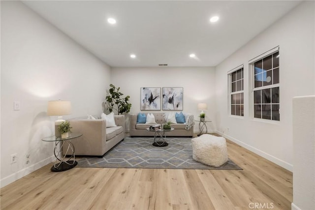 12949 Colonial Dr, Rancho Cucamonga, CA 91739 - living room with visible vents, baseboards, recessed lighting, and wood finished floors