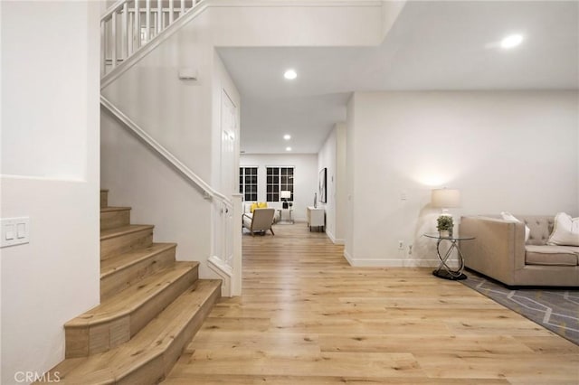 12949 Colonial Dr, Rancho Cucamonga, CA 91739 - foyer entrance featuring wood finished floors, recessed lighting, baseboards, and stairway