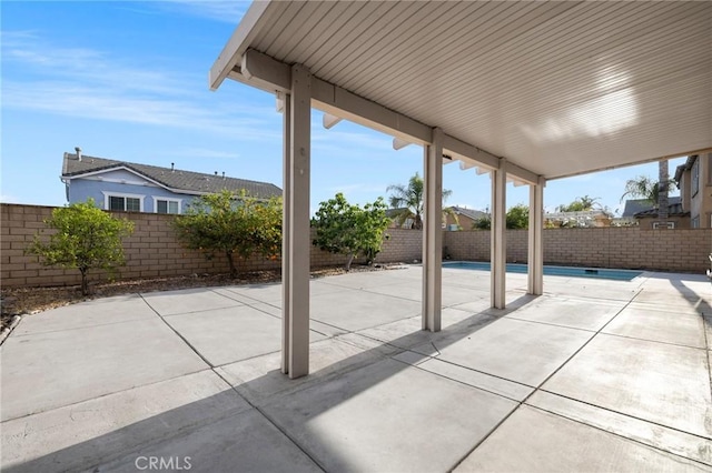 12949 Colonial Dr, Rancho Cucamonga, CA 91739 - view of patio with a fenced backyard and a fenced in pool