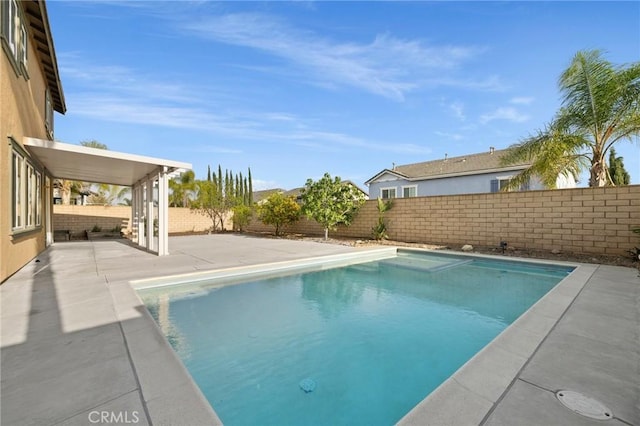 12949 Colonial Dr, Rancho Cucamonga, CA 91739 - view of pool featuring a fenced in pool, a patio area, and a fenced backyard