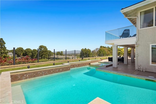 66 Drakes Bay Dr, Corona Del Mar, CA 92625 - view of swimming pool featuring a pool with connected hot tub and a mountain view