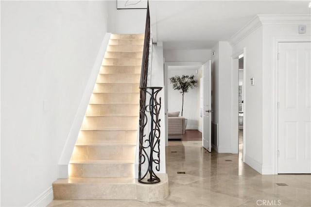 66 Drakes Bay Dr, Corona Del Mar, CA 92625 - staircase featuring baseboards and crown molding