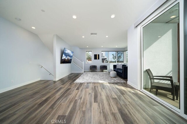 430 Transport, Tustin, CA 92782 - unfurnished living room featuring wood finished floors, baseboards, and recessed lighting