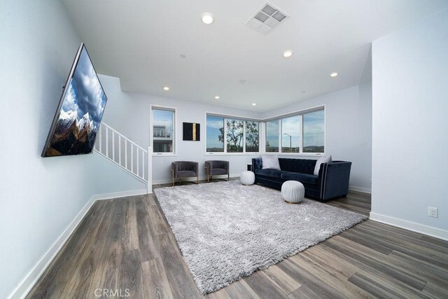 430 Transport, Tustin, CA 92782 - living area featuring wood finished floors, baseboards, stairs, and recessed lighting