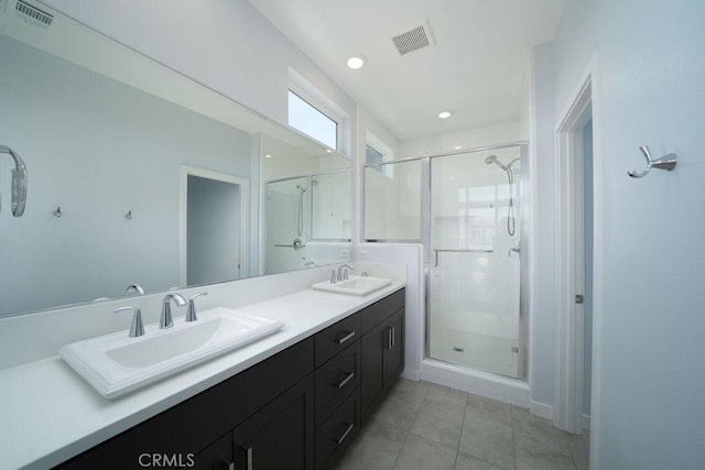 430 Transport, Tustin, CA 92782 - full bathroom featuring a shower stall, double vanity, and tile patterned flooring