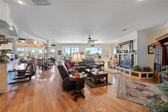 30594 Longhorn Dr, Canyon Lake, CA 92587 - living room featuring healthy amount of natural light, a ceiling fan, wood finished floors, recessed lighting, and ornamental molding
