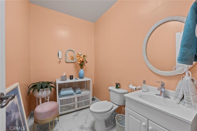 30594 Longhorn Dr, Canyon Lake, CA 92587 - half bathroom with marble look tile flooring, vanity, and toilet