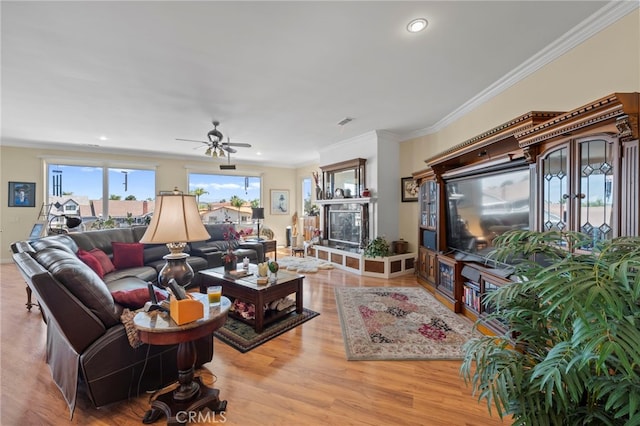 30594 Longhorn Dr, Canyon Lake, CA 92587 - living room featuring wood finished floors, ceiling fan, crown molding, and recessed lighting