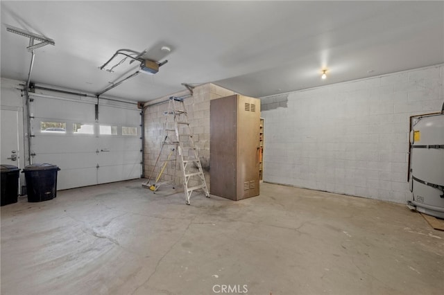 30594 Longhorn Dr, Canyon Lake, CA 92587 - garage featuring a garage door opener and concrete block wall
