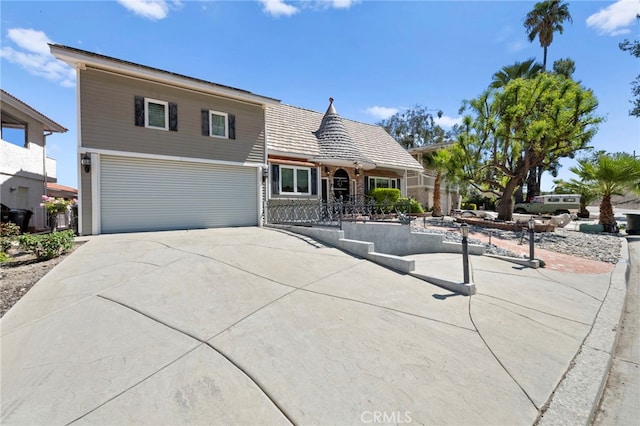 30594 Longhorn Dr, Canyon Lake, CA 92587 - view of front of house featuring driveway and an attached garage
