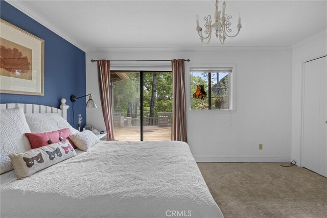 carpeted bedroom with a chandelier, access to exterior, multiple windows, and crown molding