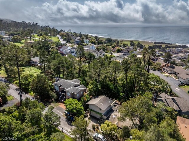 drone / aerial view featuring a residential view and a water view