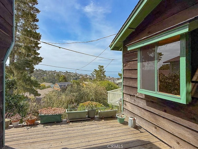 view of home's exterior with a balcony