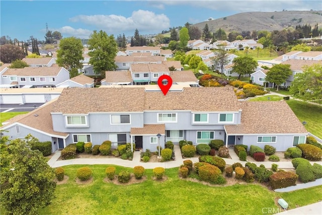 bird's eye view with a mountain view and a residential view