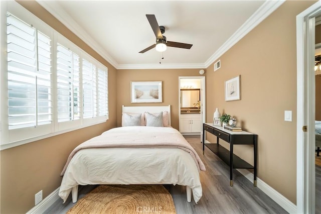 bedroom featuring crown molding, wood finished floors, multiple windows, and visible vents