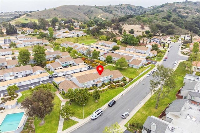 bird's eye view with a residential view and a mountain view