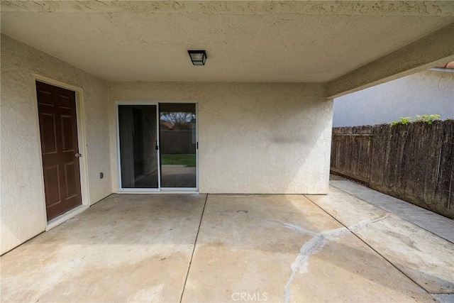 view of patio with fence