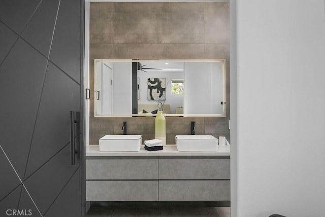 199 Las Flores, Aliso Viejo, CA 92656 - bathroom with double vanity, ceiling fan, and tile patterned flooring