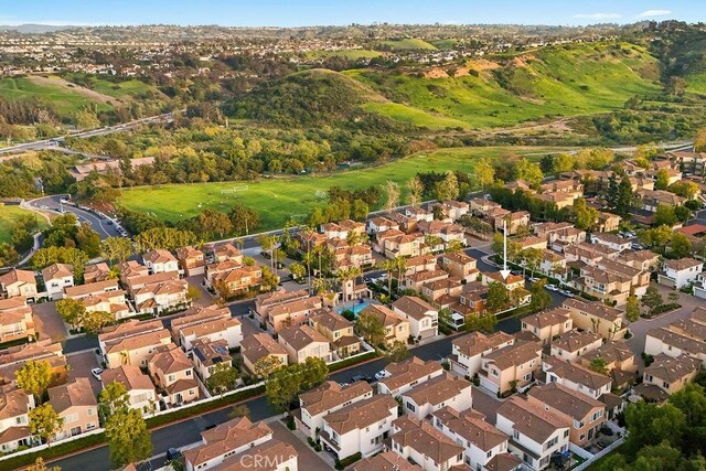 aerial view of property's location with nearby suburban area
