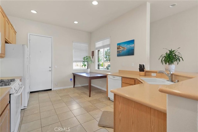 19547 Valley Ct, Apple Valley, CA 92308 - kitchen with light brown cabinets, recessed lighting, white appliances, light tile patterned floors, and a sink