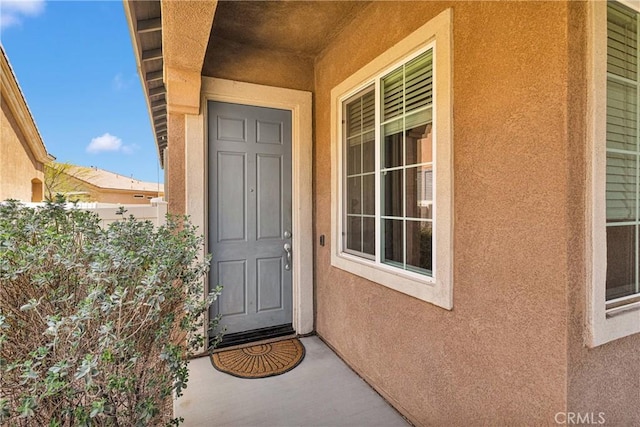19547 Valley Ct, Apple Valley, CA 92308 - property entrance featuring stucco siding