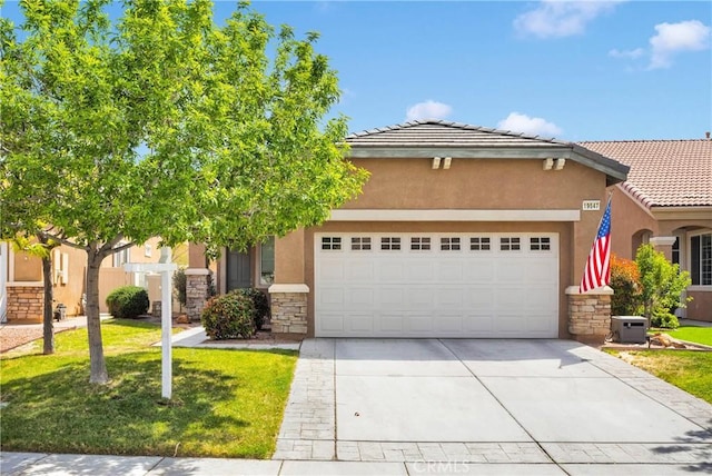 19547 Valley Ct, Apple Valley, CA 92308 - view of front facade featuring an attached garage, stone siding, driveway, and stucco siding