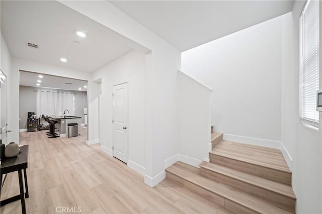 5313 Mariner Ln, Chino, CA 91710 - staircase featuring wood finished floors, baseboards, and recessed lighting