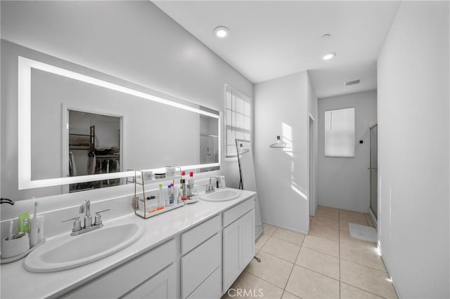 5313 Mariner Ln, Chino, CA 91710 - full bathroom featuring tile patterned flooring, double vanity, visible vents, and a sink