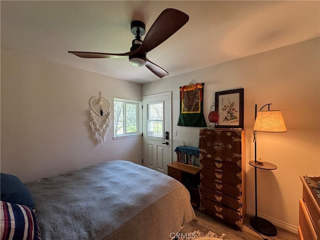 bedroom featuring ceiling fan