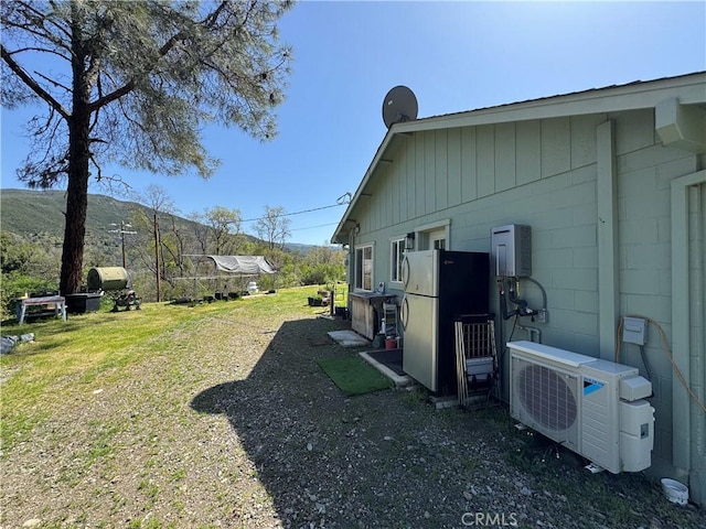 view of yard with ac unit