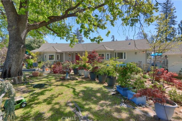 exterior space featuring a front lawn