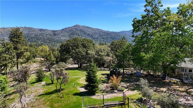 surrounding community with a mountain view