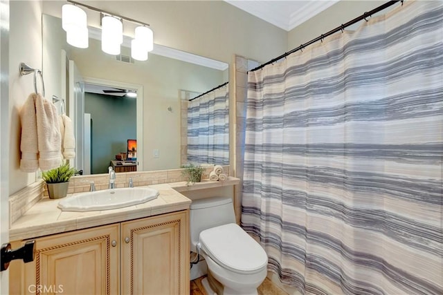 ensuite bathroom featuring visible vents, ornamental molding, toilet, vanity, and ensuite bath