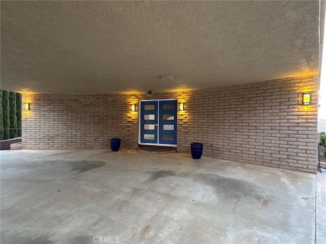 11901 Sunset Ridge Dr, Yucaipa, CA 92399 - doorway to property with brick siding